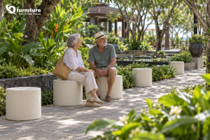 Cream concrete stools along a garden path, an example of outdoor concrete furniture styling Cream concrete stools along a garden path, an example of outdoor concrete furniture styling