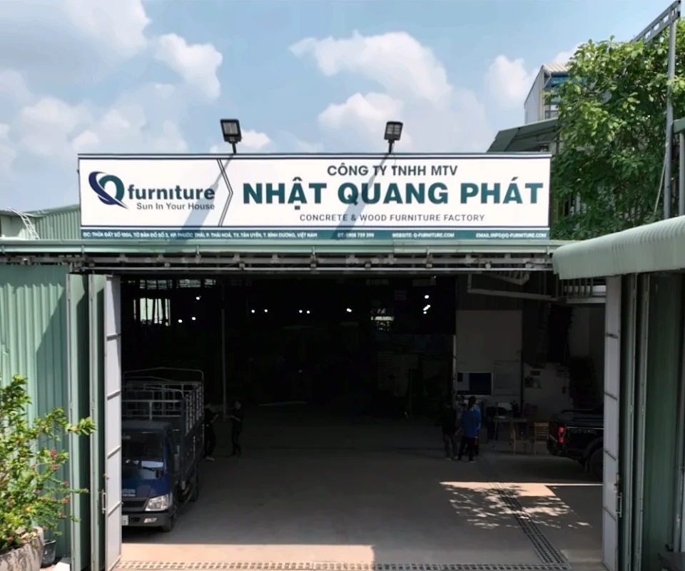 Entrance of the Nhat Quang Phat Co., Ltd. concrete and wood furniture factory, home of Q-Furniture