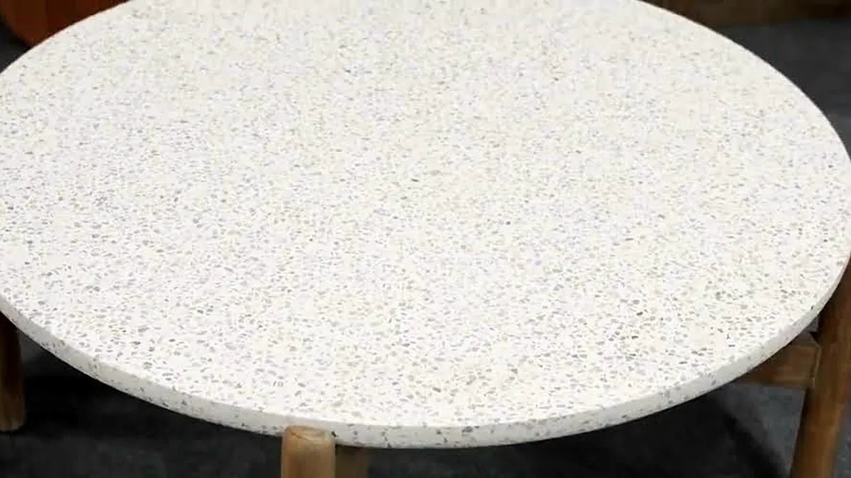 Close-up of a speckled terrazzo concrete table top